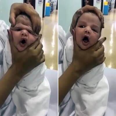 Video: Nữ y tá đùa bằng cách vặn vẹo khuôn mặt trẻ sơ sinh 3