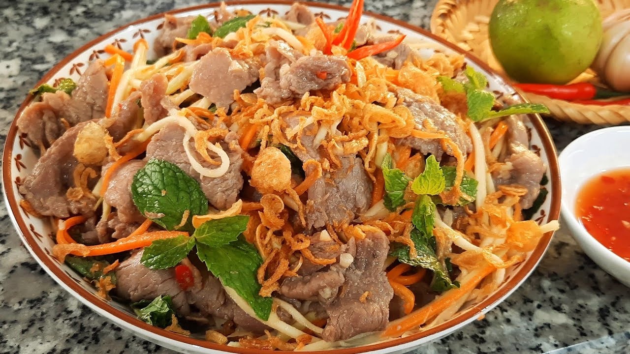 cách làm gỏi bò chua ngọt trộn xoài hấp dẫn cách làm gỏi bò chua ngọt trộn xoài